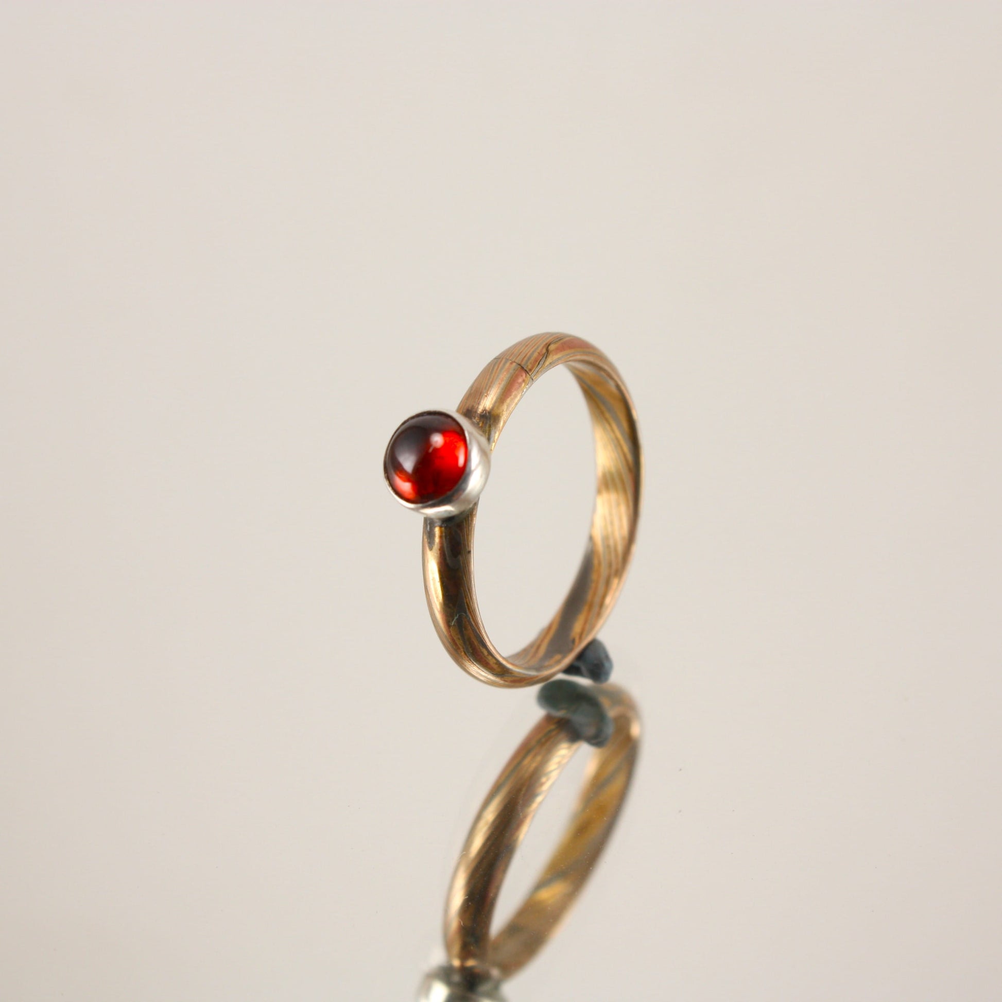 Mokume-Ring-with-Garnet