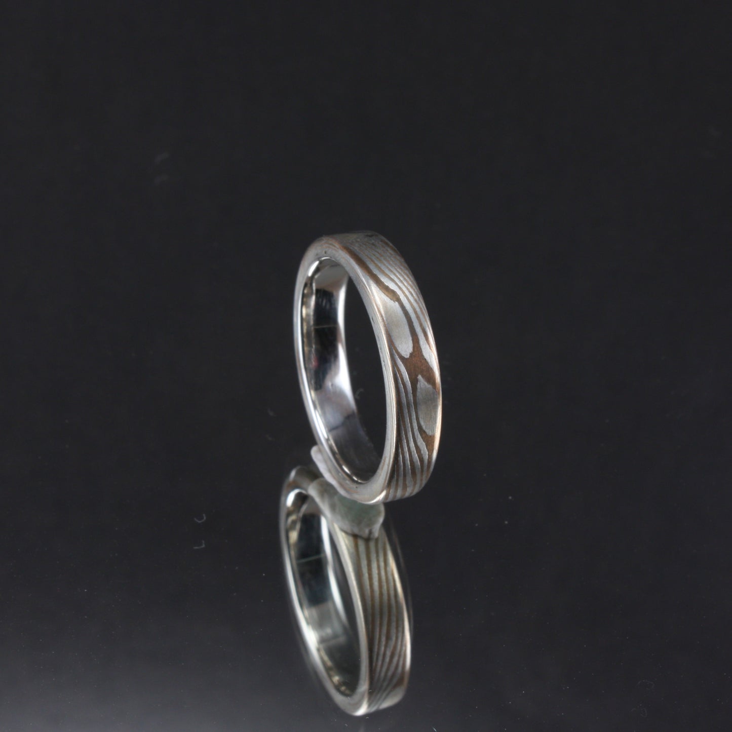 bronze and silver mokume ring.