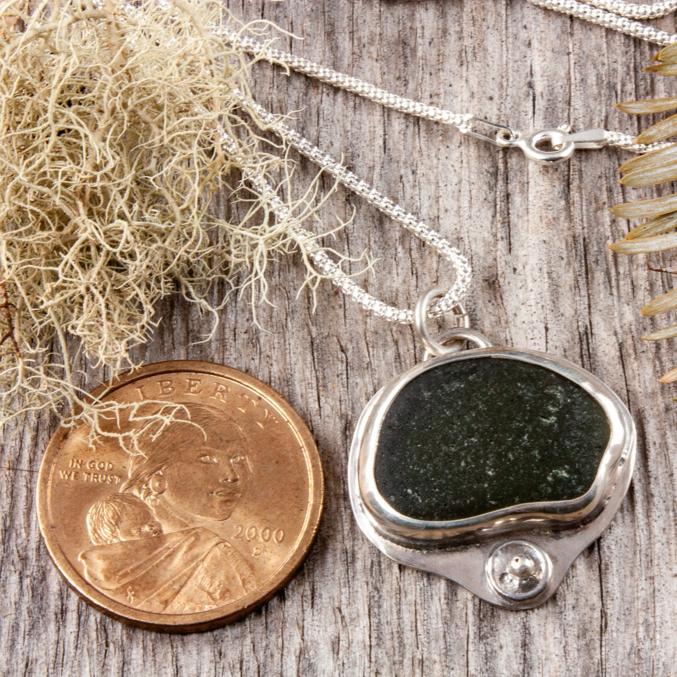 dark green sea glass necklace.