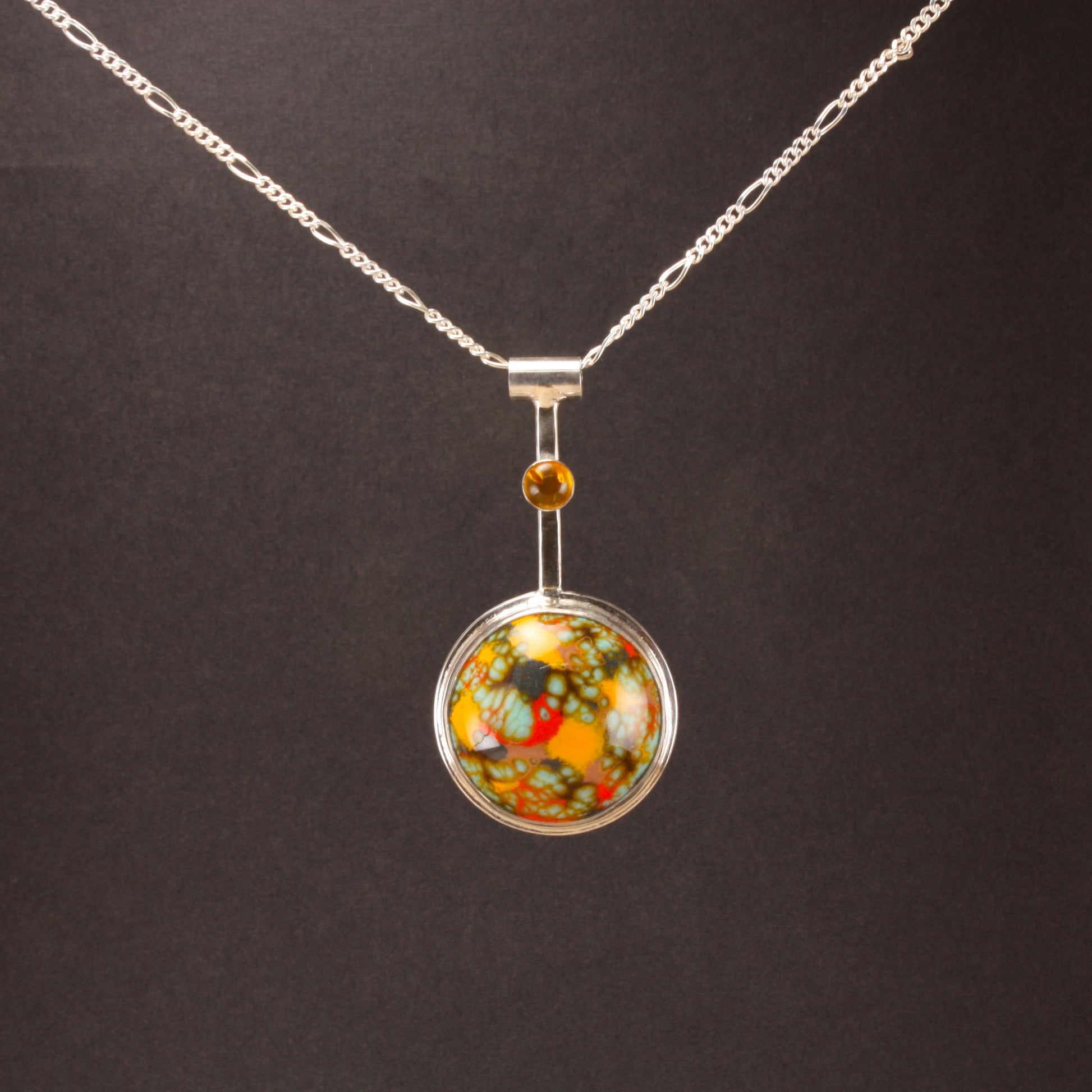 enamel pendant with amber..