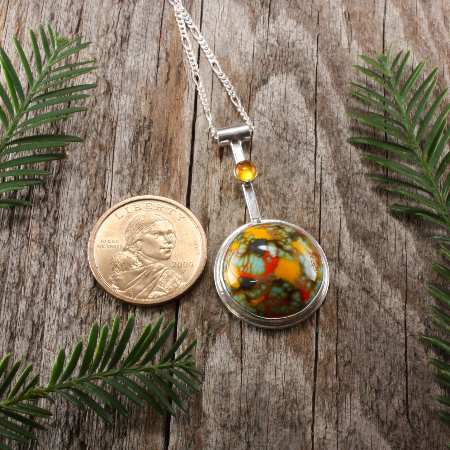 enamel pendant with amber.