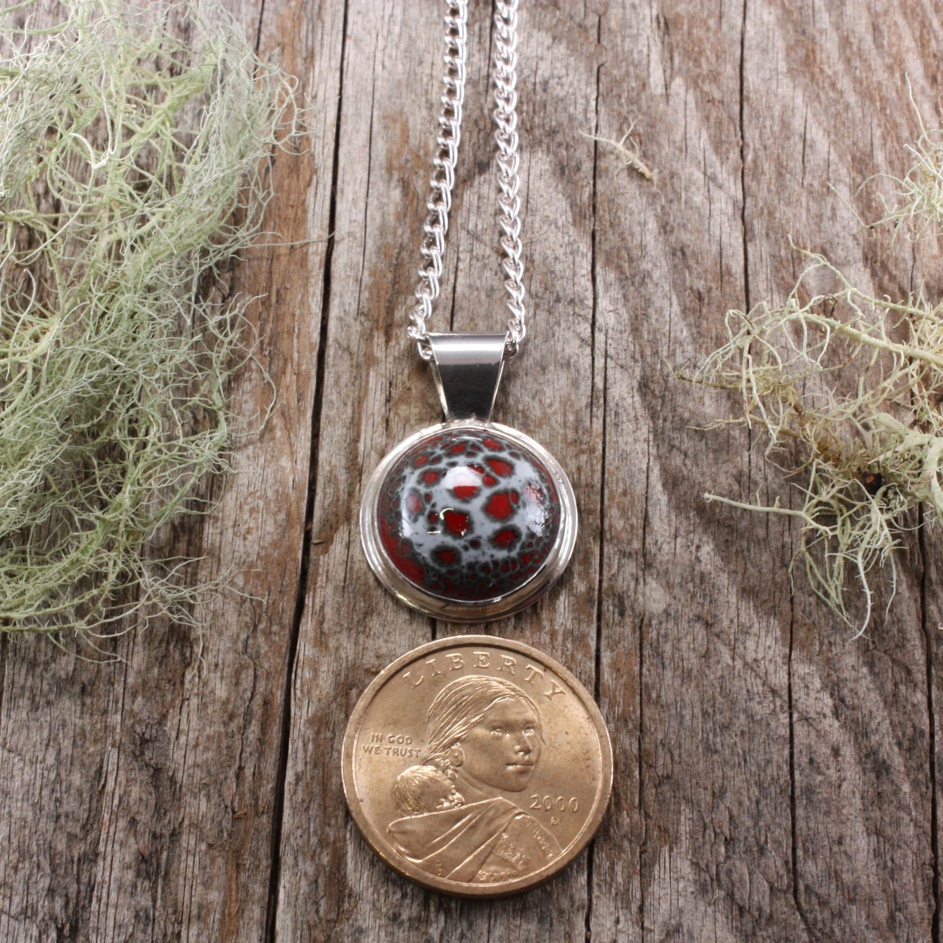 red enamel pendant.