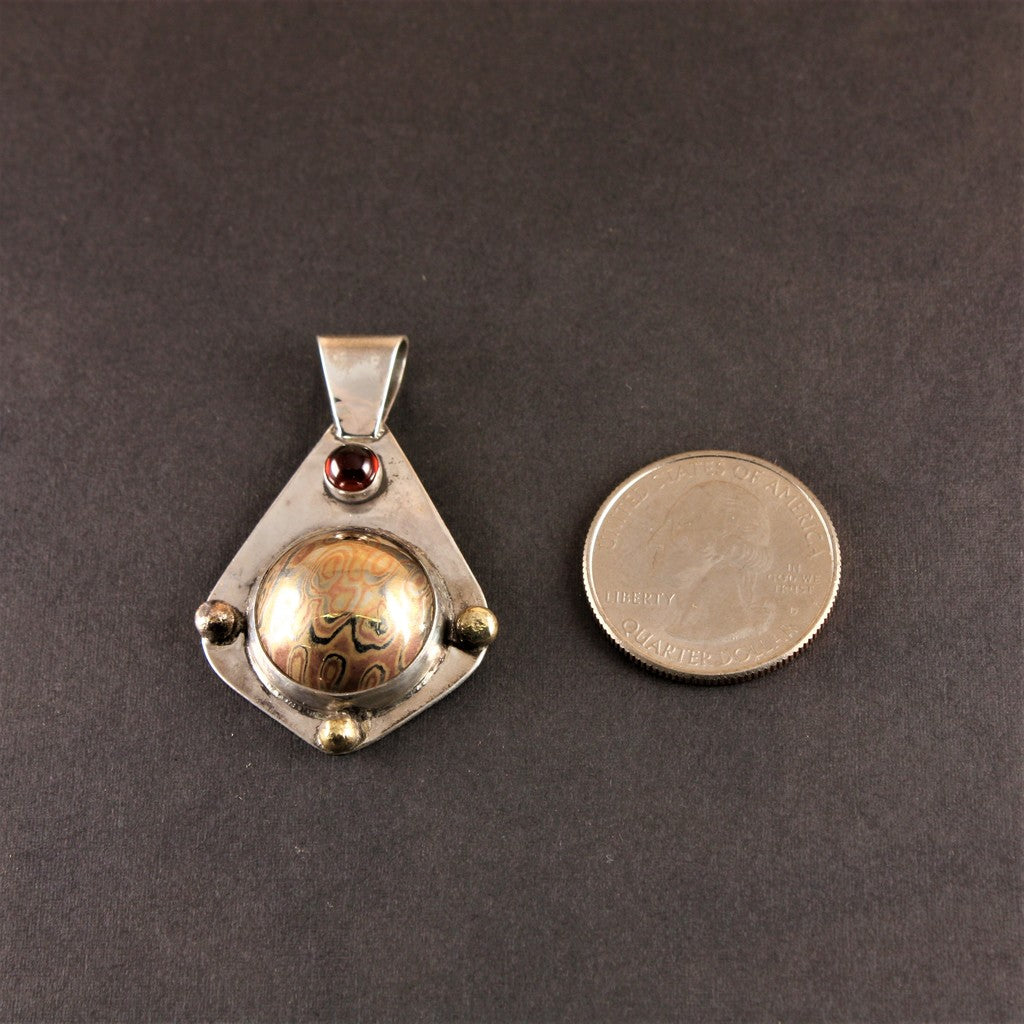 Tear-Drop-Mokume-Pendant-With-14k-Garnet