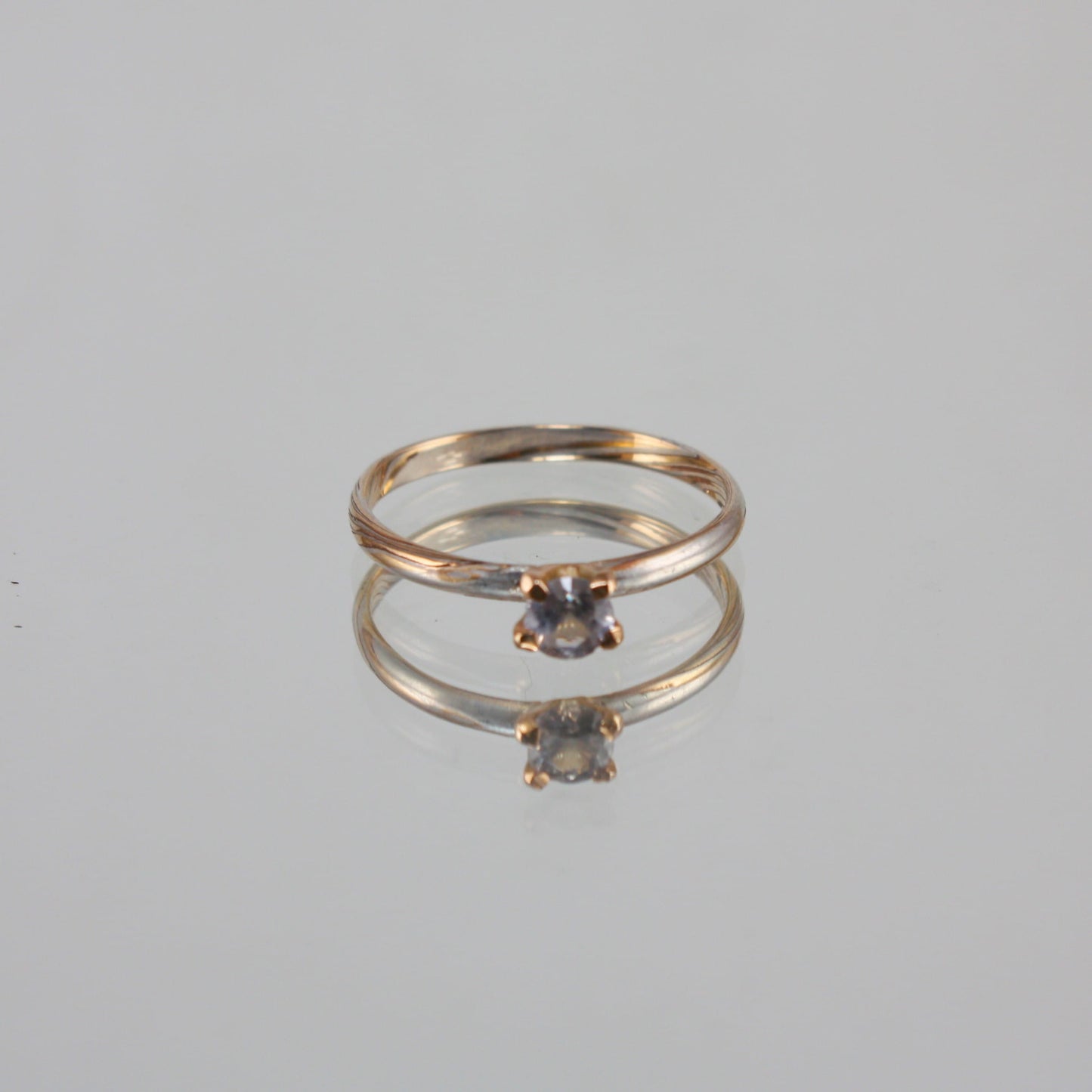 Gold-Mokume-Ring-with-White-Topaz