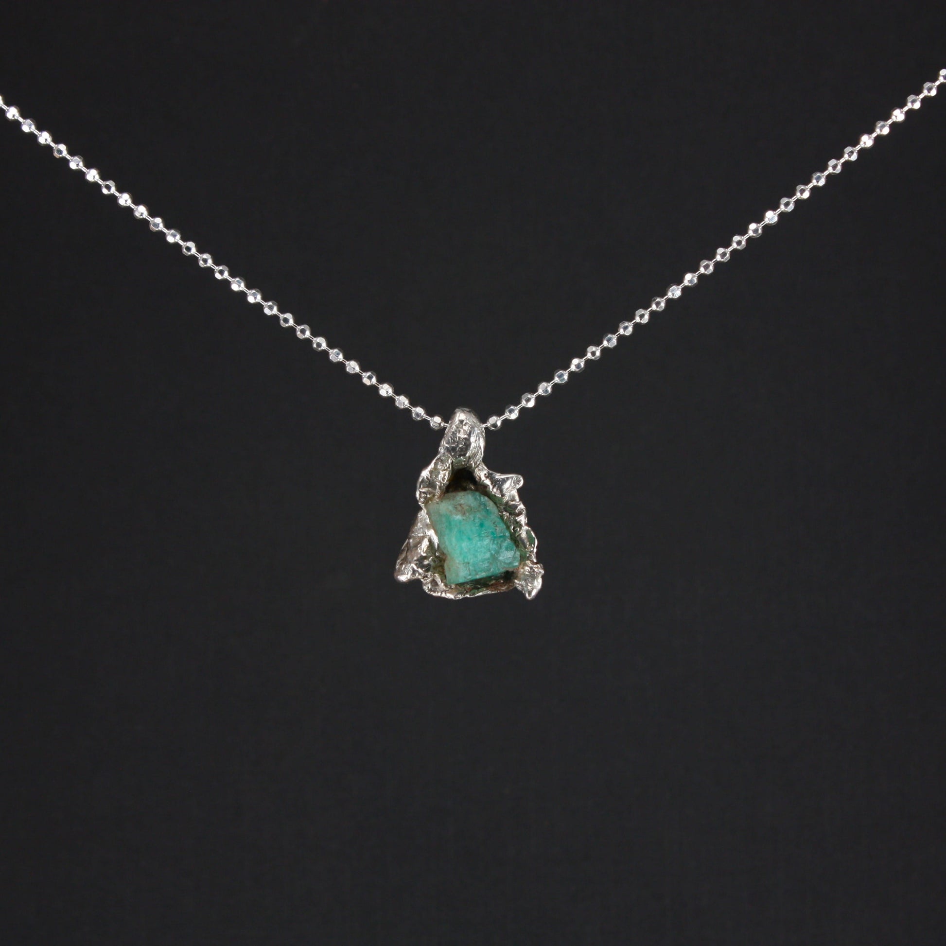 Water-Cast-with-Emerald-Necklace