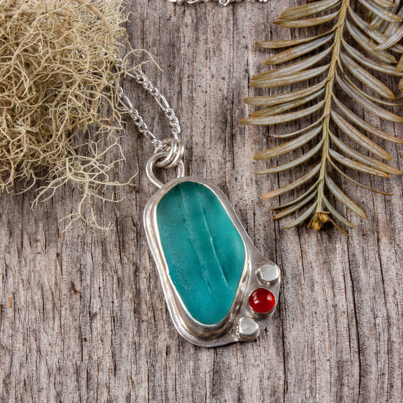 aqua sea glass with carnelian.