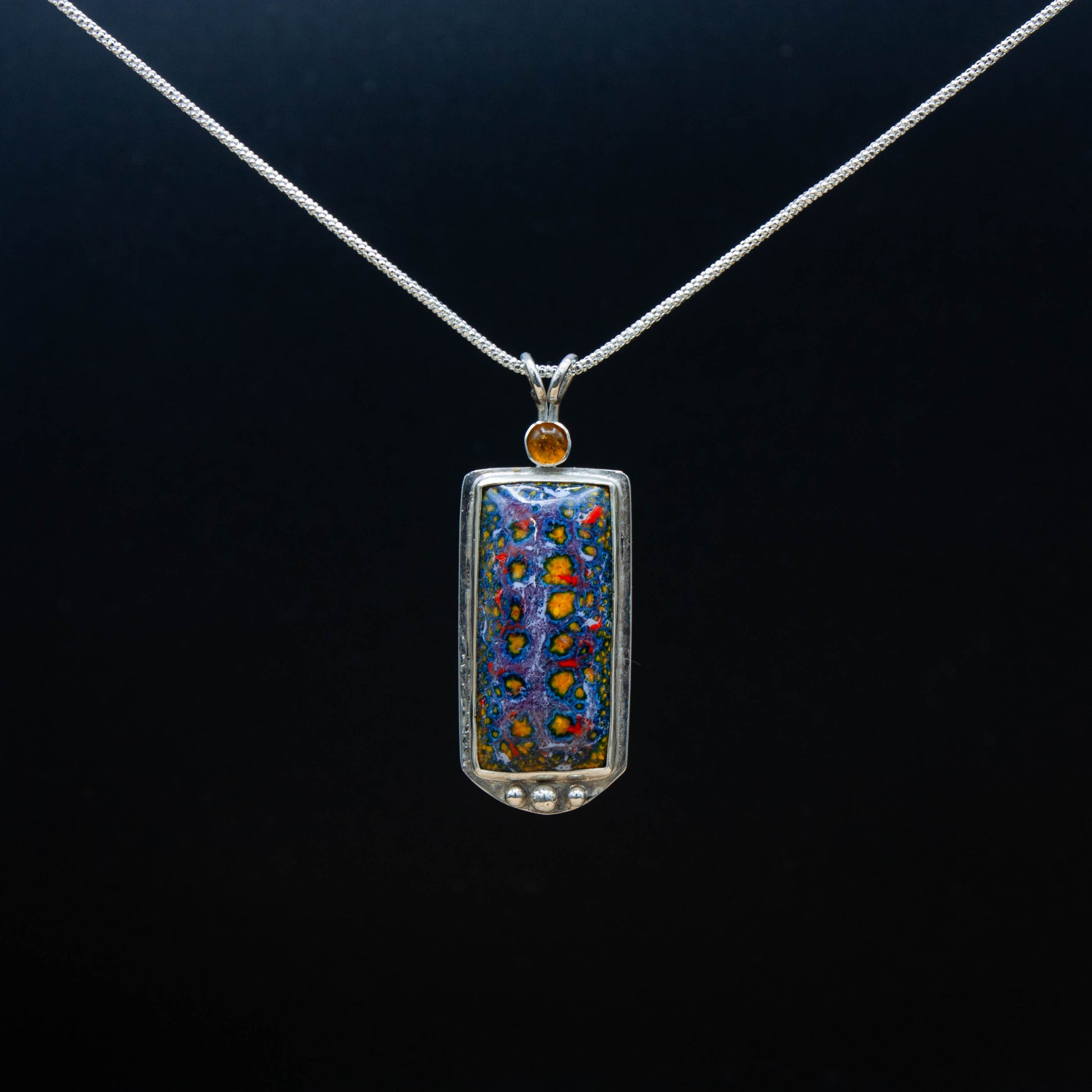 Enamel Pendant with an Amber Cabochon