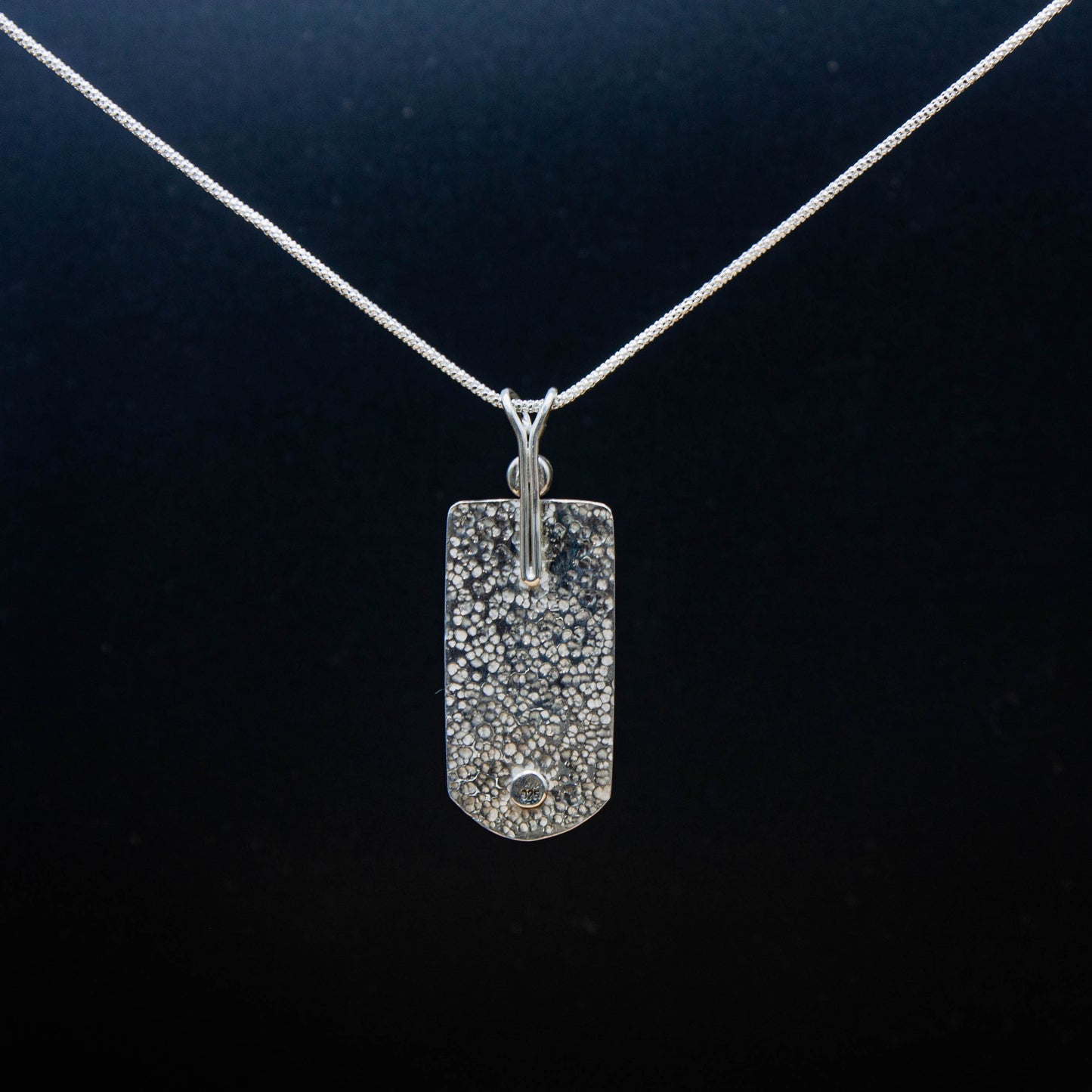 Enamel Pendant with an Amber Cabochon