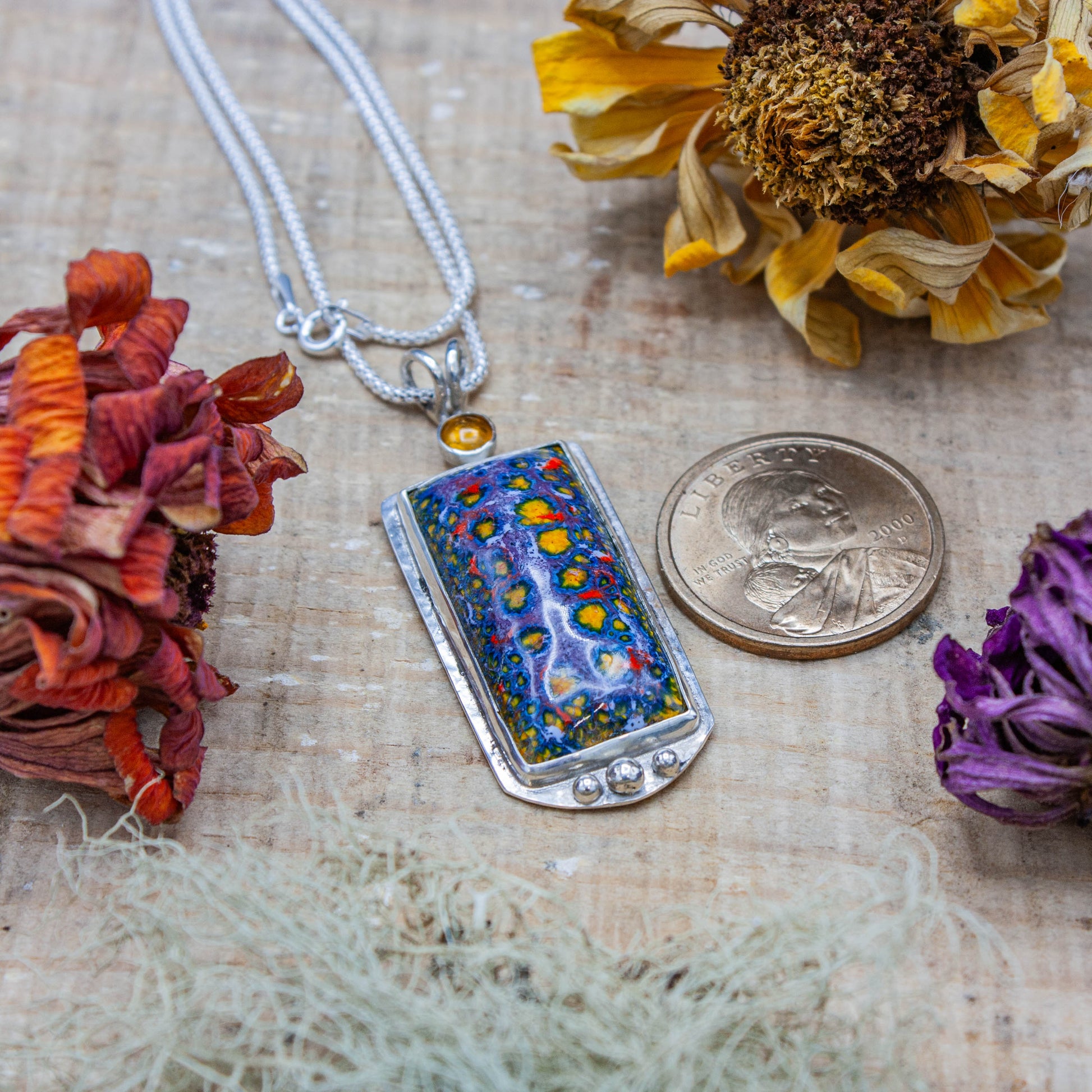 Enamel Pendant with an Amber Cabochon