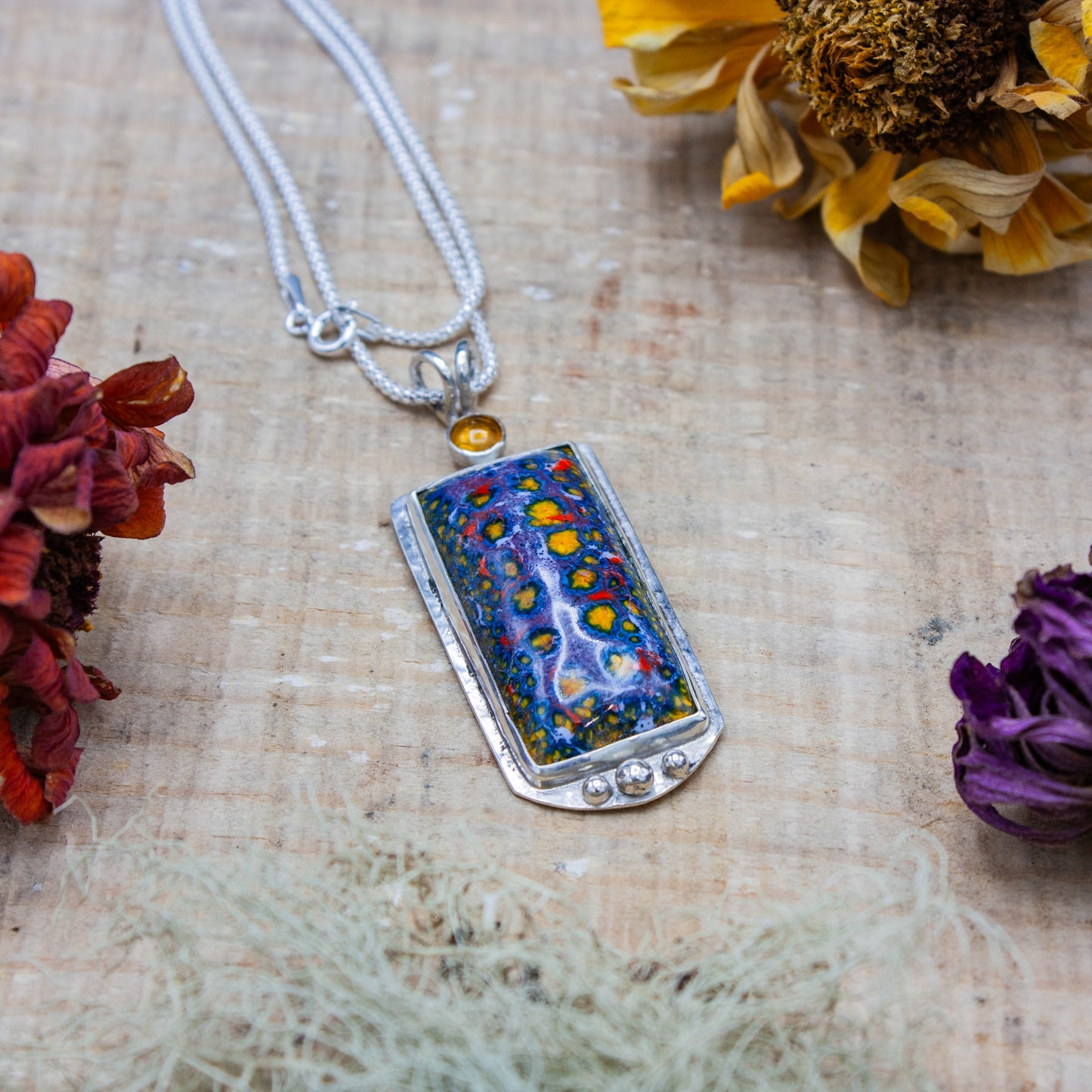 Enamel Pendant with an Amber Cabochon