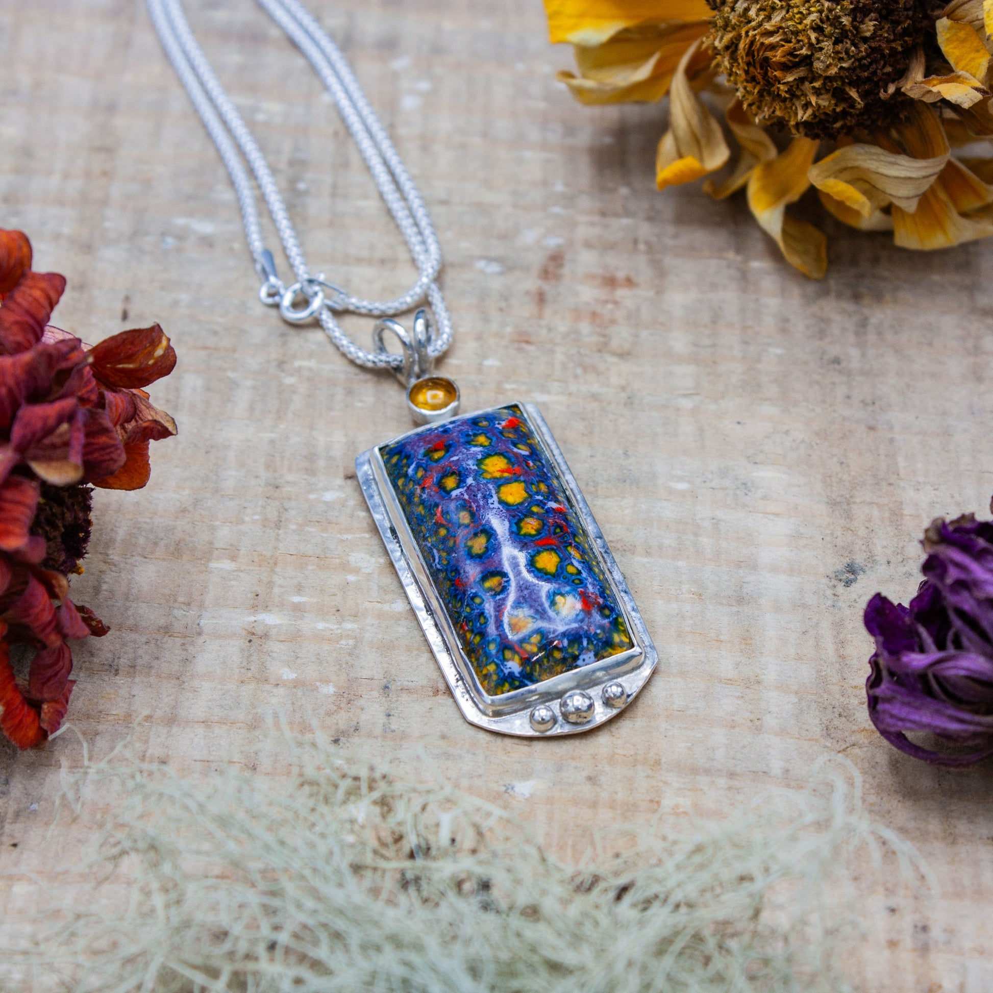 Enamel Pendant with an Amber Cabochon