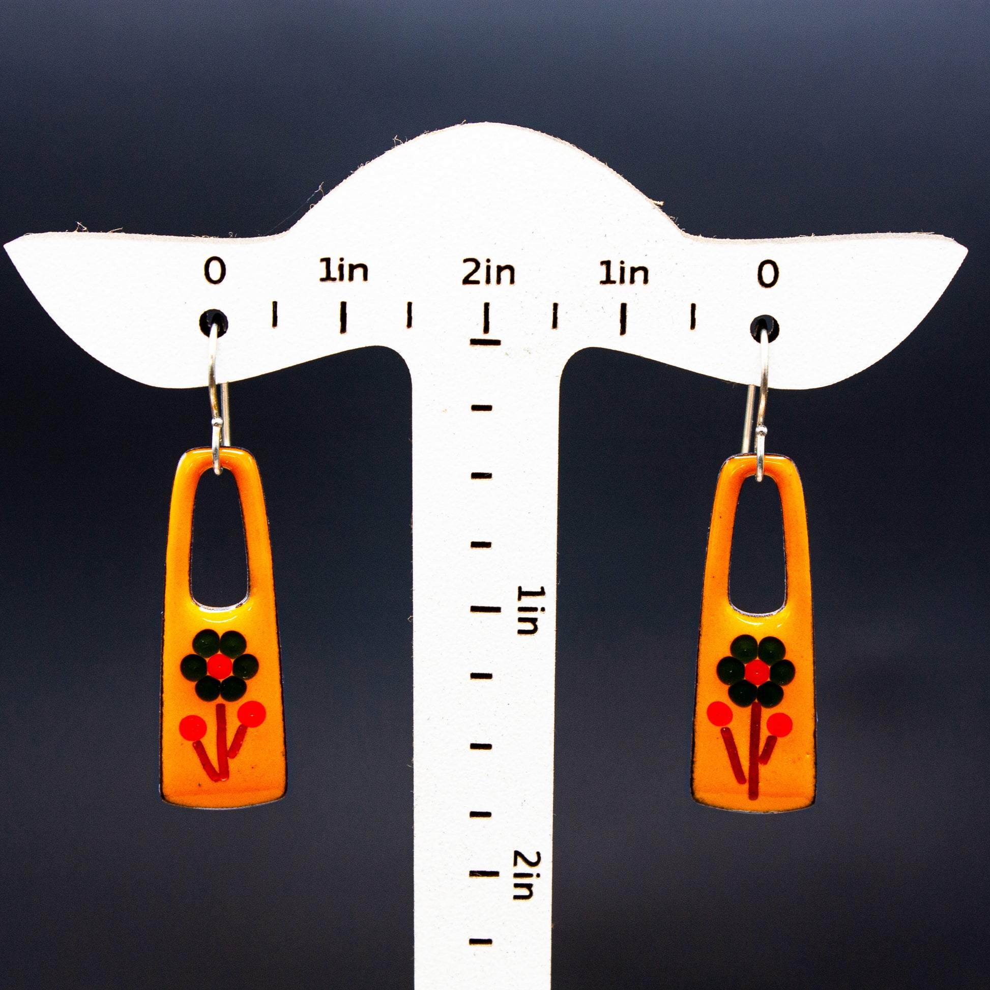 orange floral drop earrings..