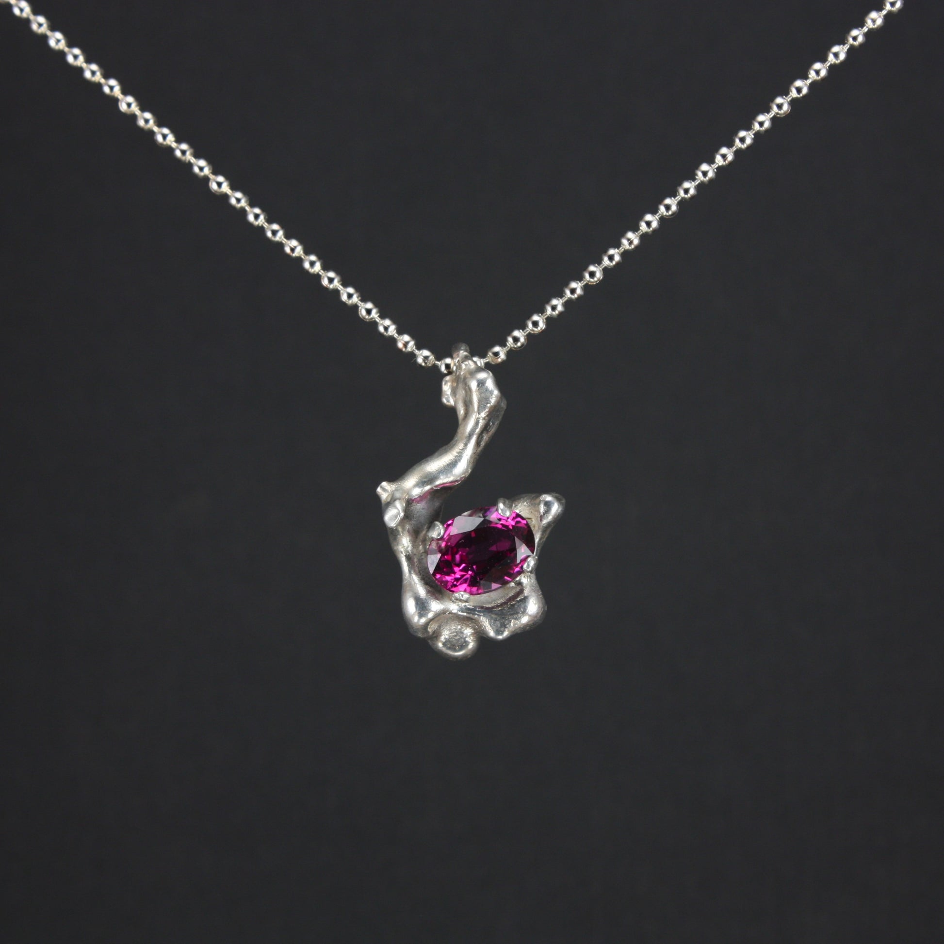 water cast necklace with garnet